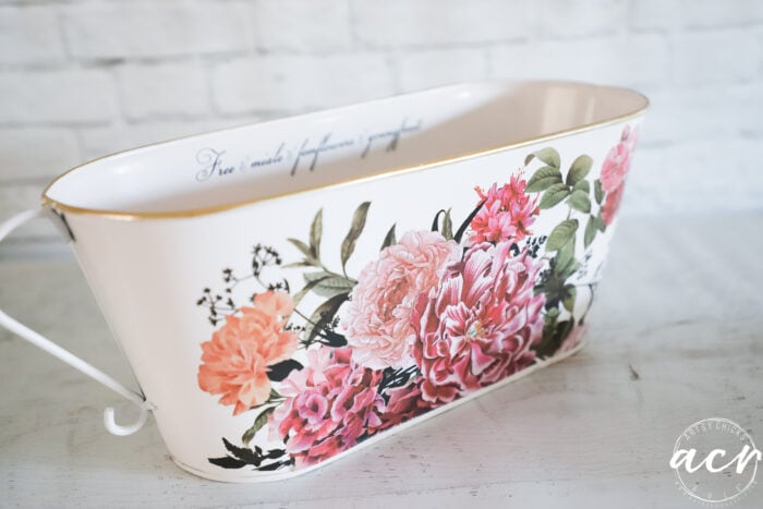 white metal bucket with floral transfer