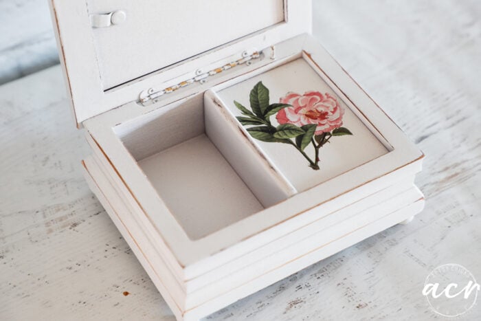 little white box open with pink flower