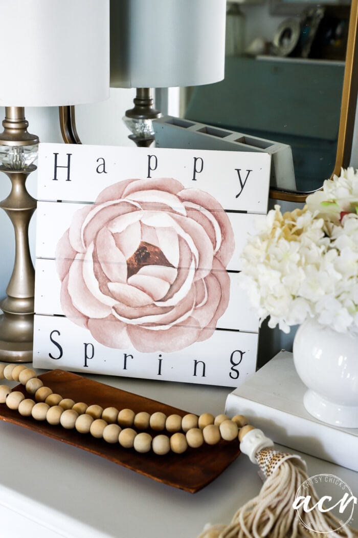 happy spring sign on foyer