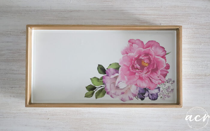 gold rimmed white tray with pink flowers