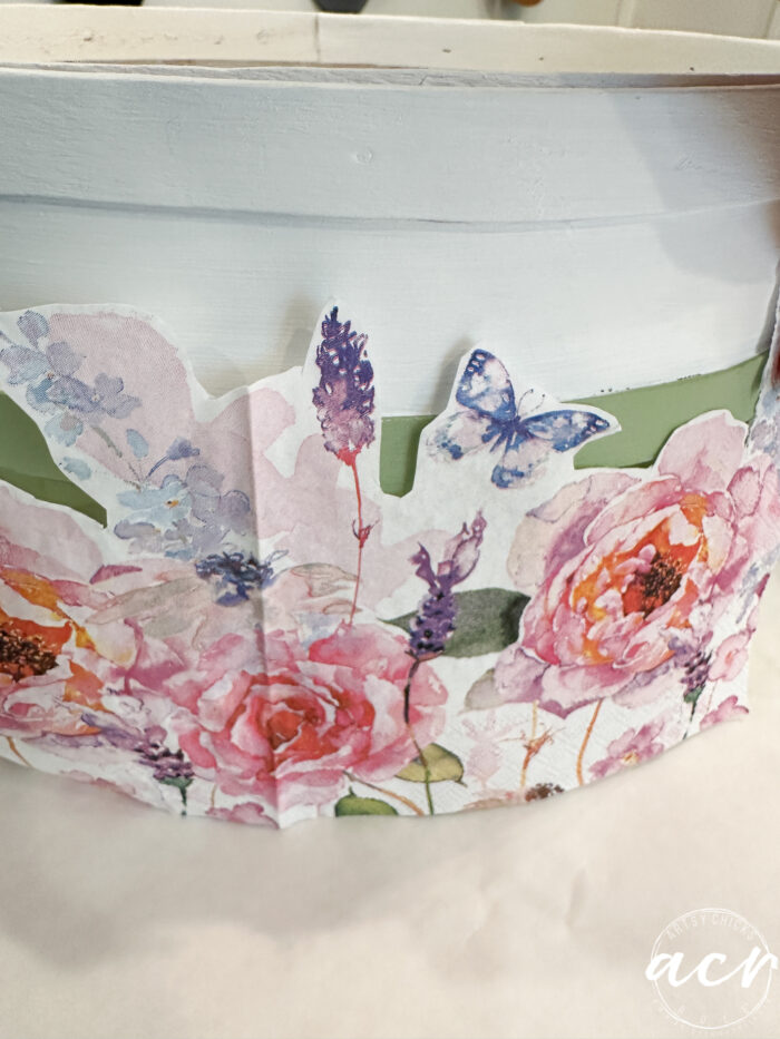 floral napkin on side of basket before applying