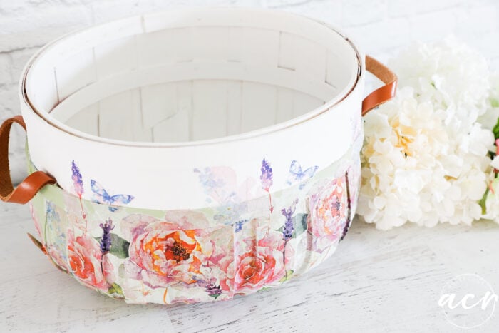 white and green basket with floral napkin decoupage on white top