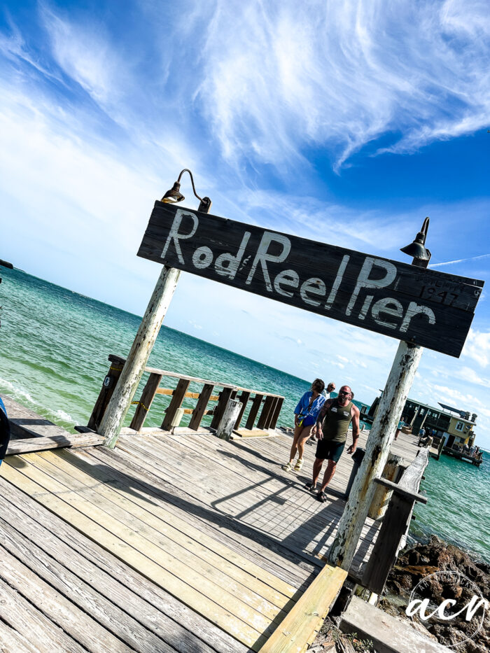 rod & reel pier sign