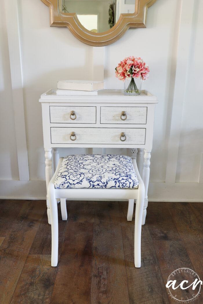 white cabinet with footstool 