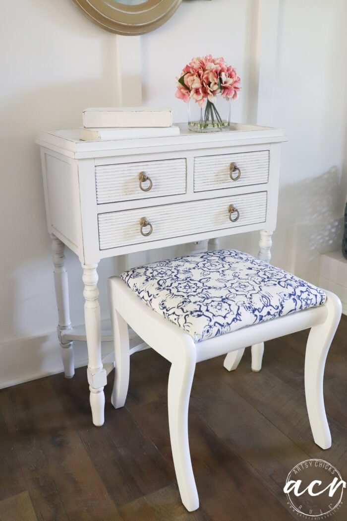 white cabinet and white footstool