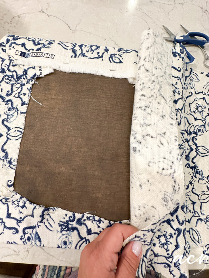 back of seat with loose fabric piece