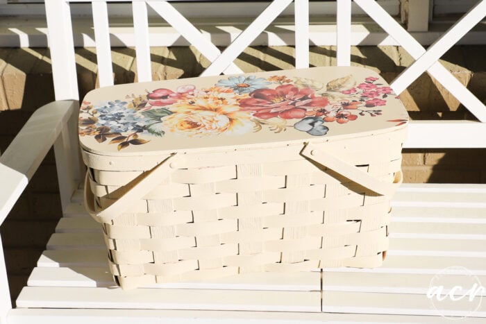 basket on white bench in sun