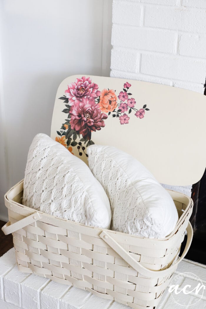 floral basket with pillows inside