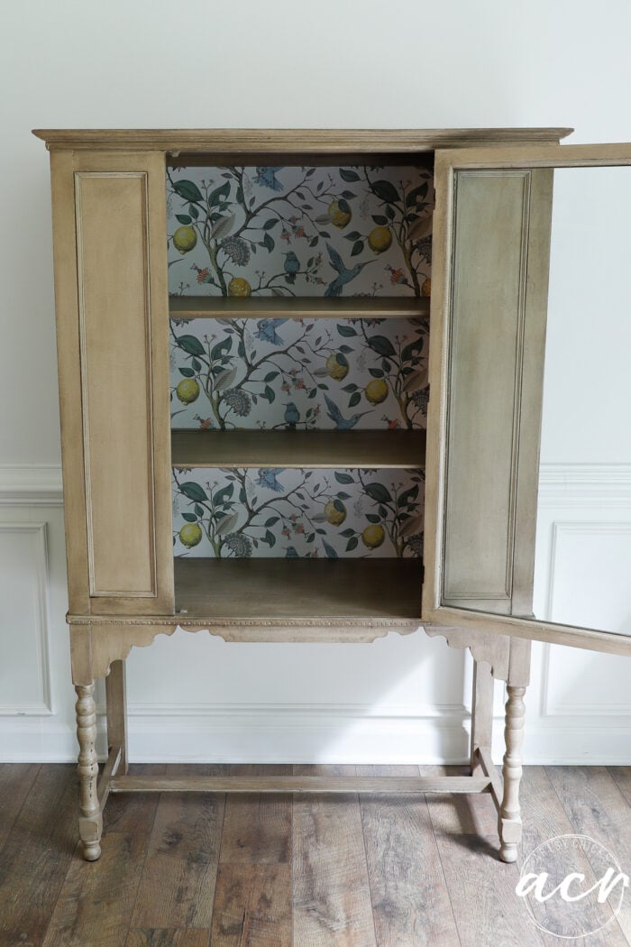 up close of antique cabinet painted to create a wood look finish