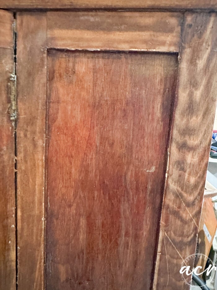 side of cabinet after being scraped