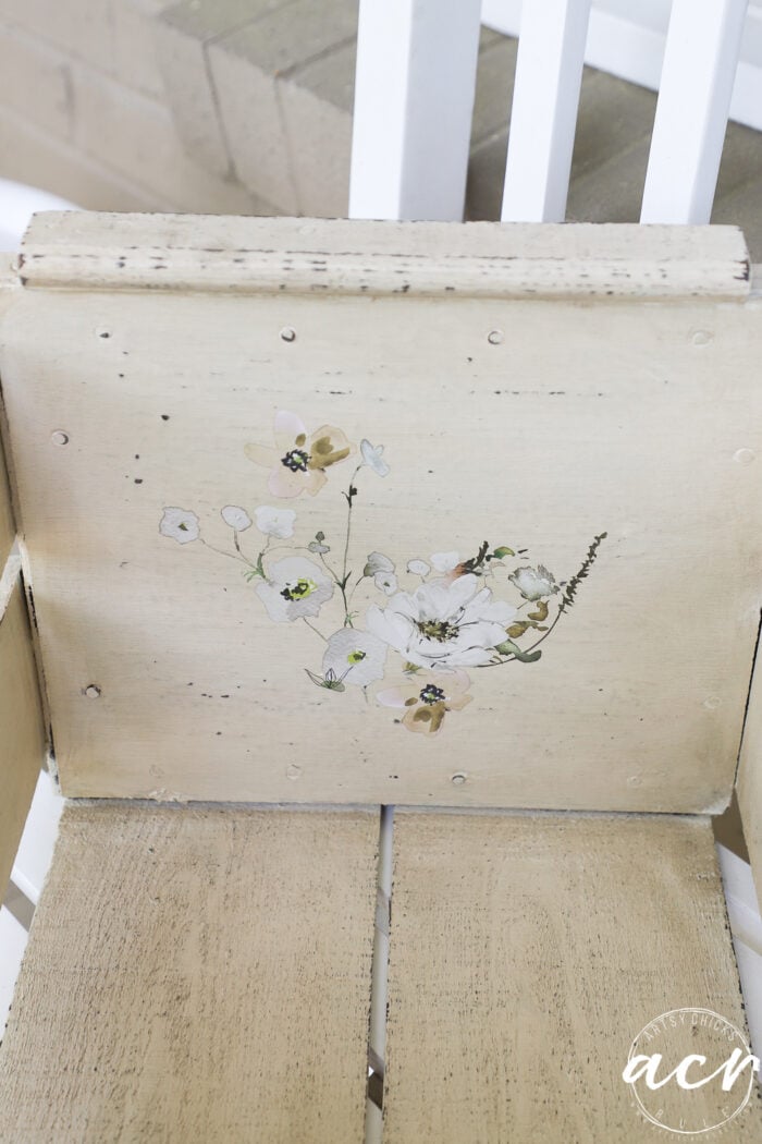 more flowers on other side of inside of crate