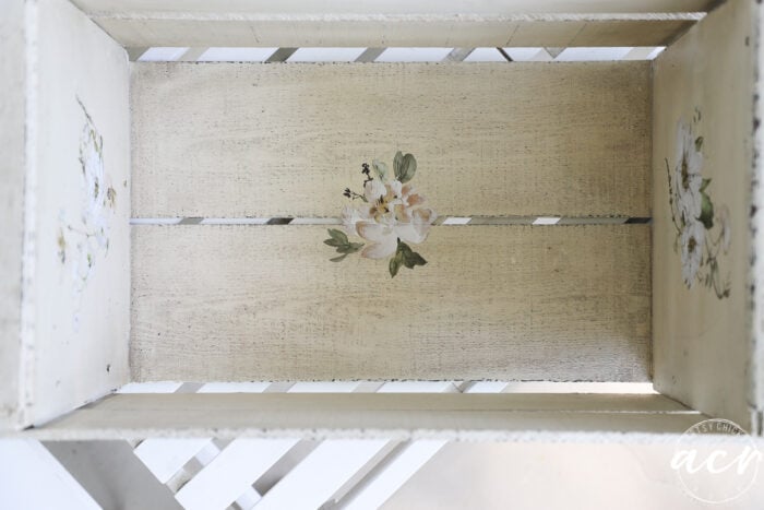 bottom of crate with flower