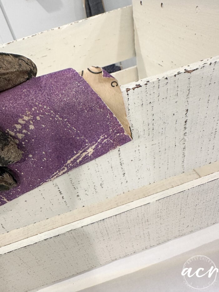 sanding the crate