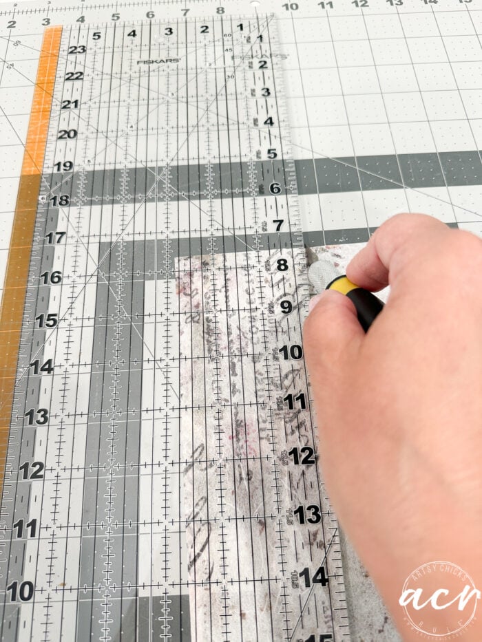 cutting the rice paper on the matte with xacto knife