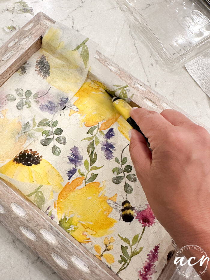 cutting excess with xacto knife