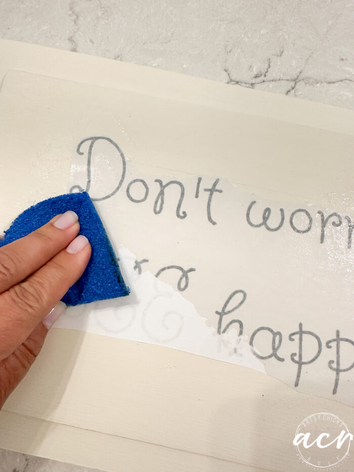 using sponge to dampen paper