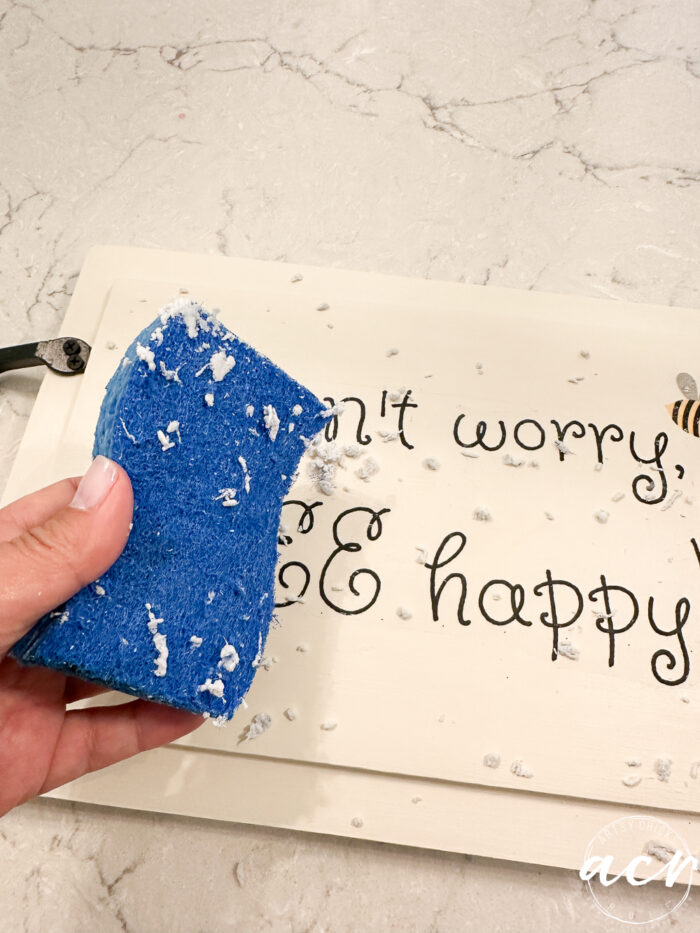 paper removed showing printed lettering left on tray
