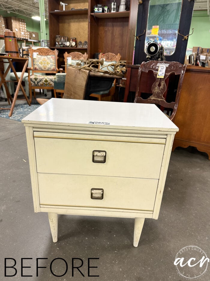 small laminate nightstand in the ReStore