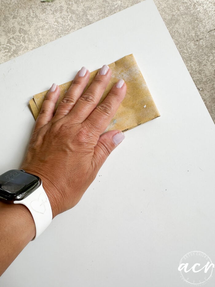 sanding the top of the nightstand