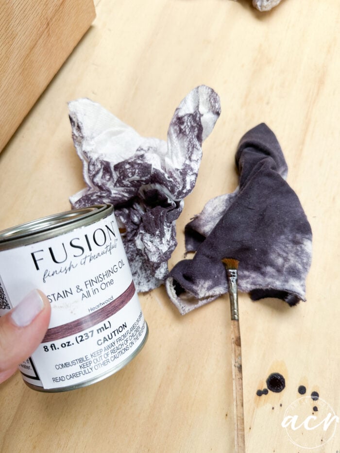 heartwood stain can and towels with purple looking stain