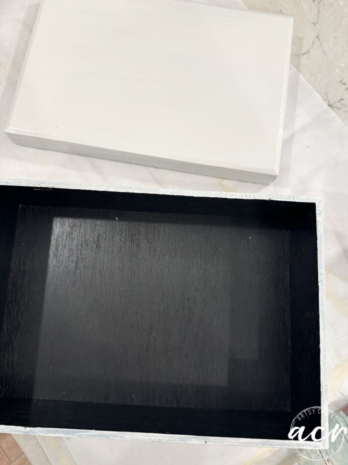 outside of box painted white inside still black