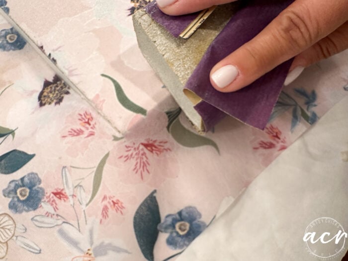 sanding edges to remove excess tissue