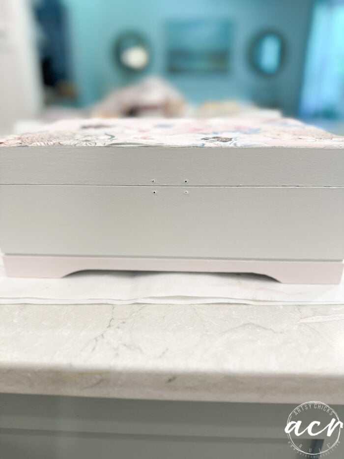 front of box painted pink and white