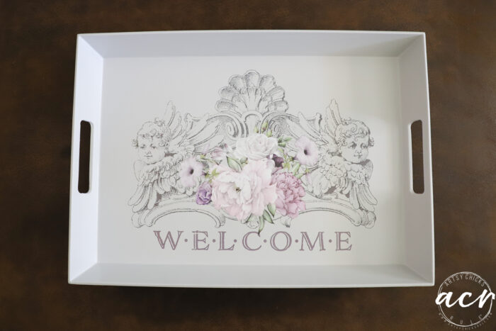 gray tray with welcome transfer