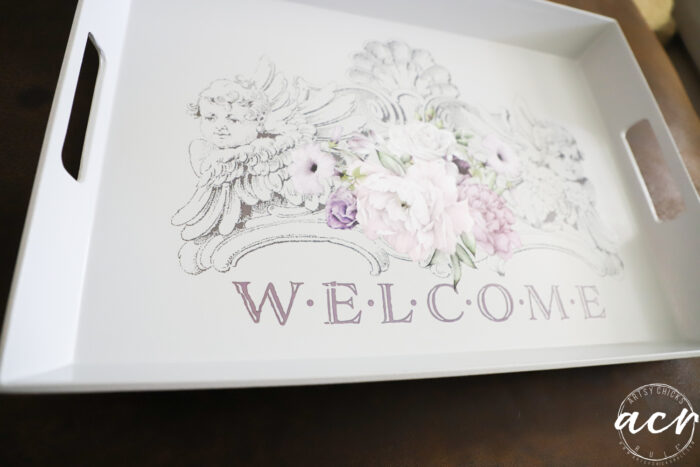 gray tray with welcome transfer
