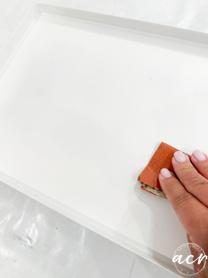 sanding white metal tray