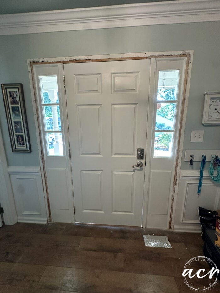 white front door from interior view