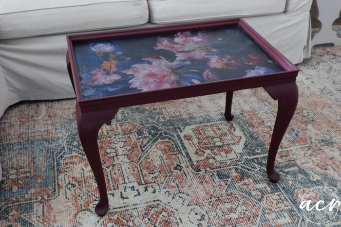 finished table on rug with couch