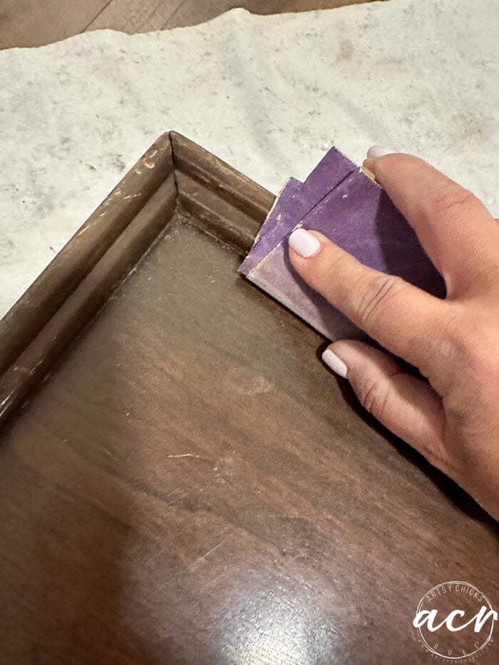 sanding with sandpaper