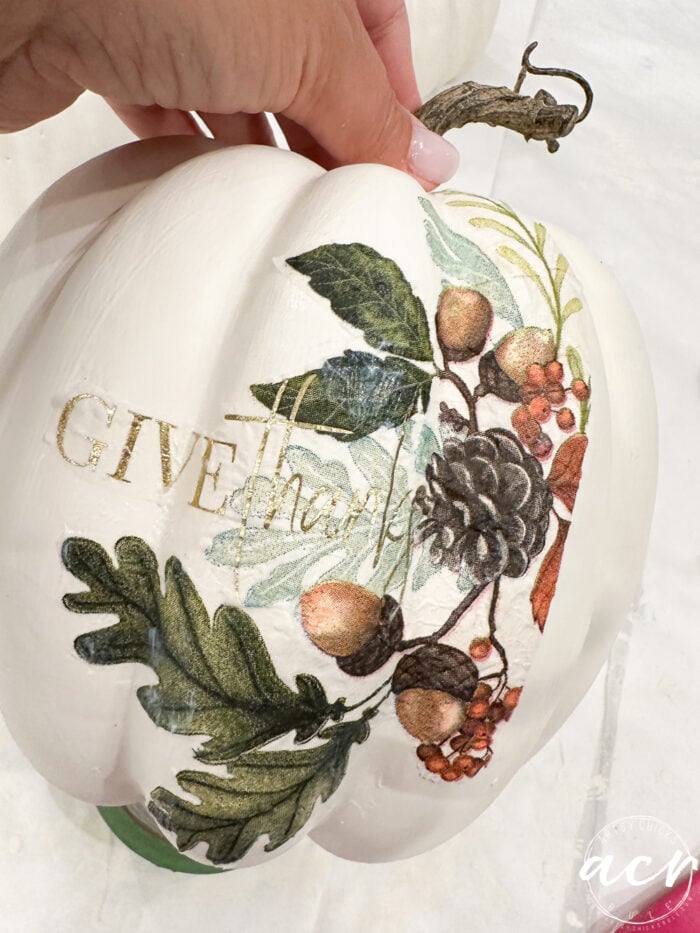 applying the napkins to the pumpkins