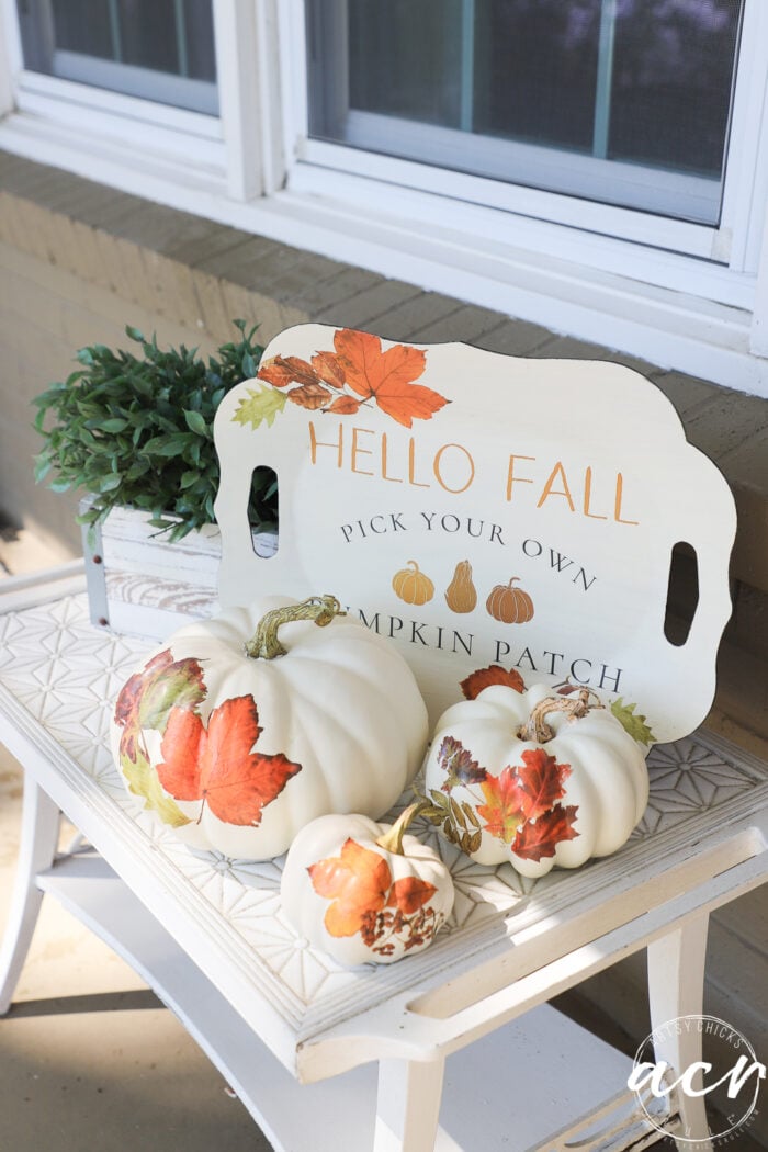 white pumpkins on white table with hello fall tray behind