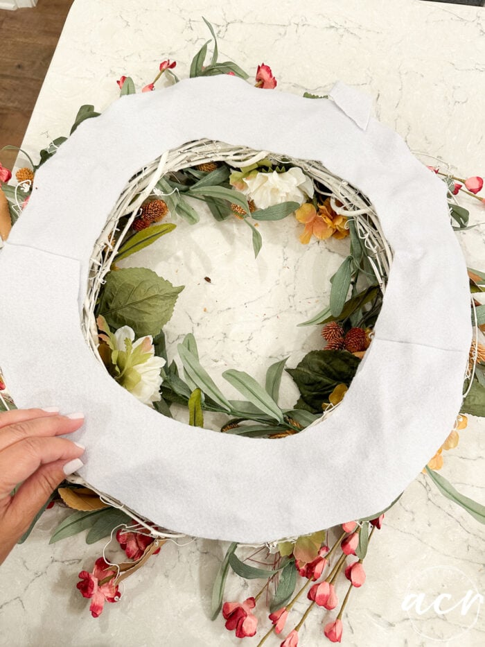 white felt cut to fit back of wreath