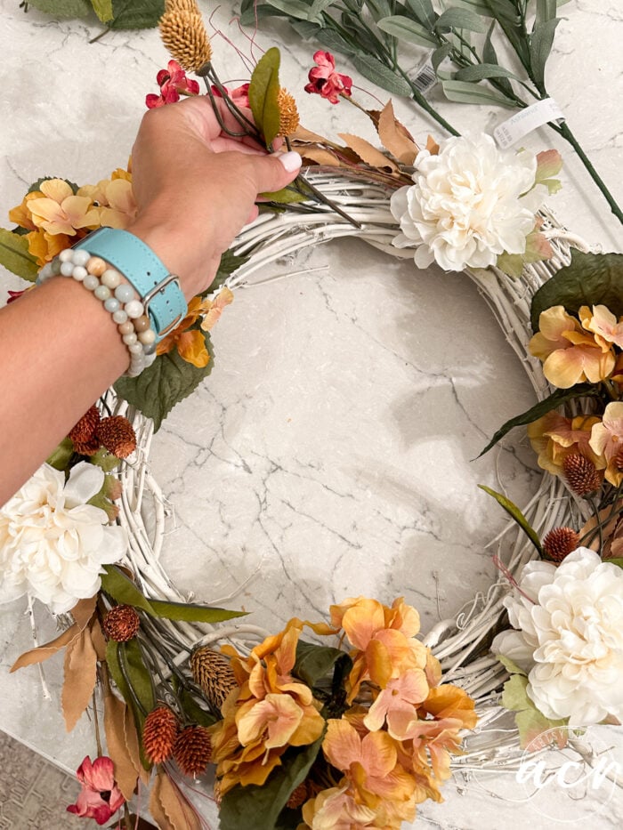 adding more to the wreath