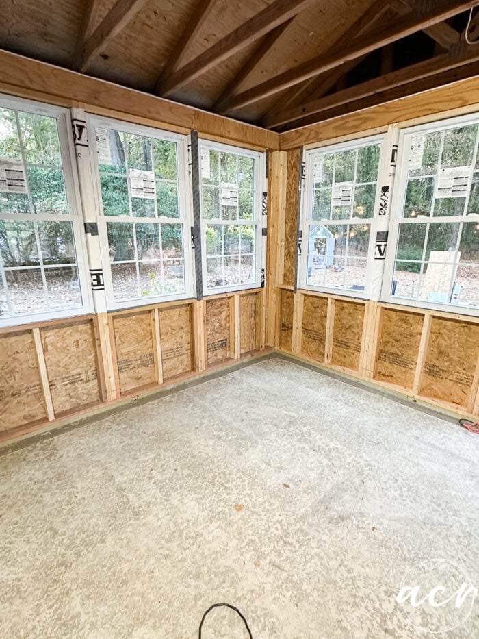 room under construction with new windows all around