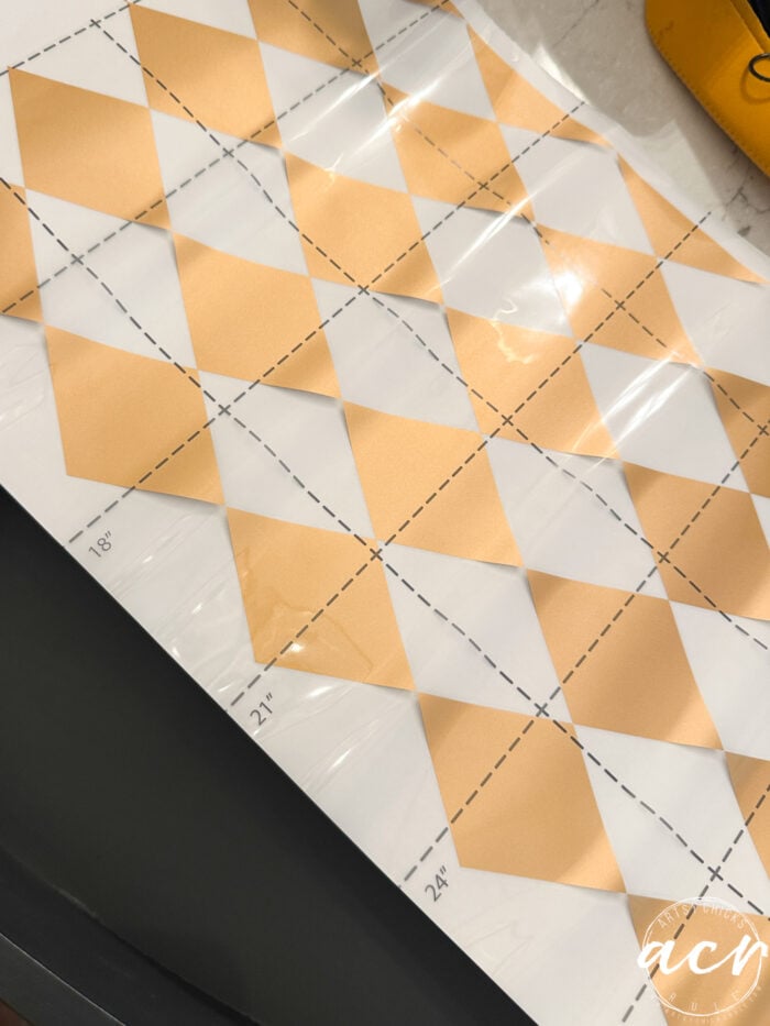 Transmisión estampada de oro de Harlekin