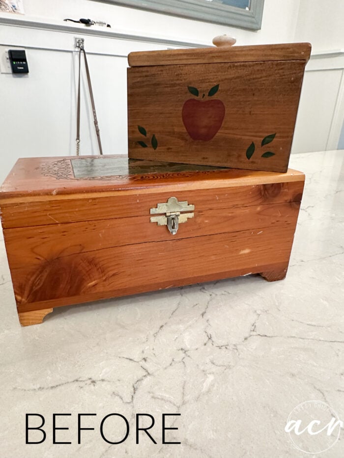 two wood boxes on counter