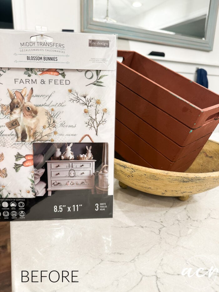 red crate, yellow bowl on counter with package of bunny transfers