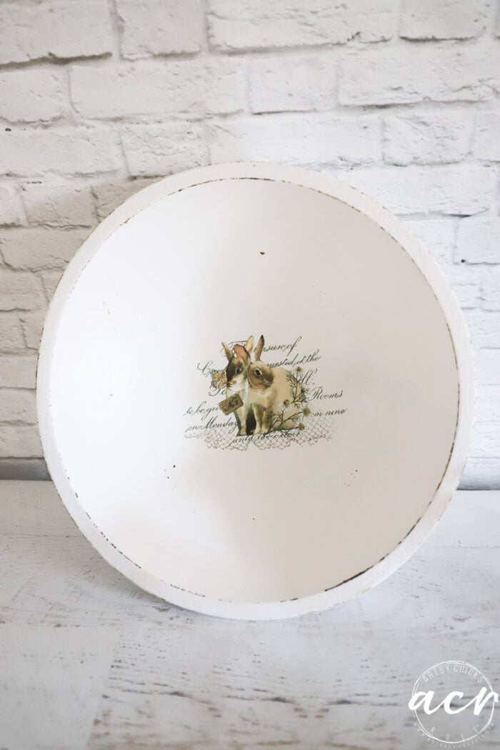 white wood bowl with bunny transfer in middle