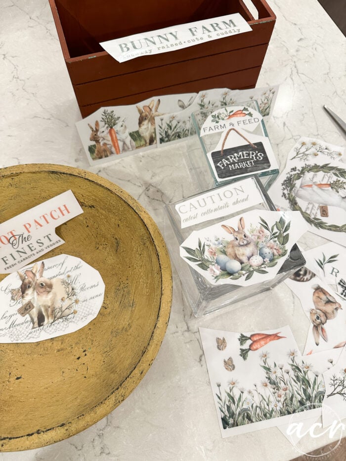 bowl and crate with cut transfers laying around