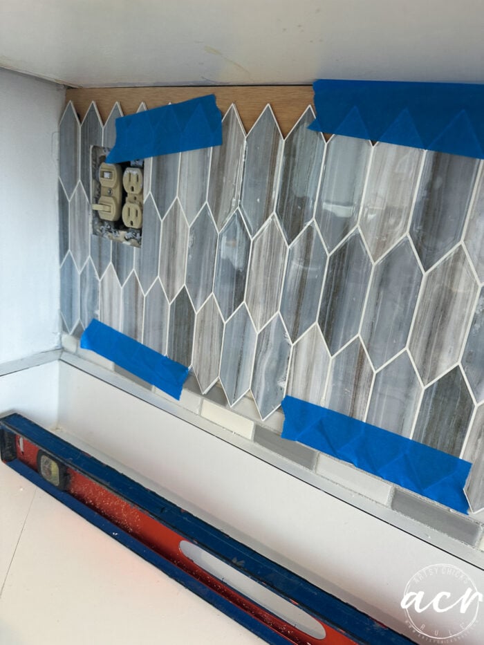 taped vinyl pieces 