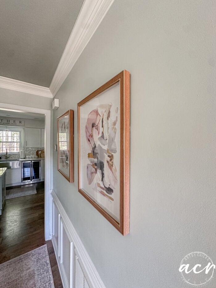 prints hanging on the wall