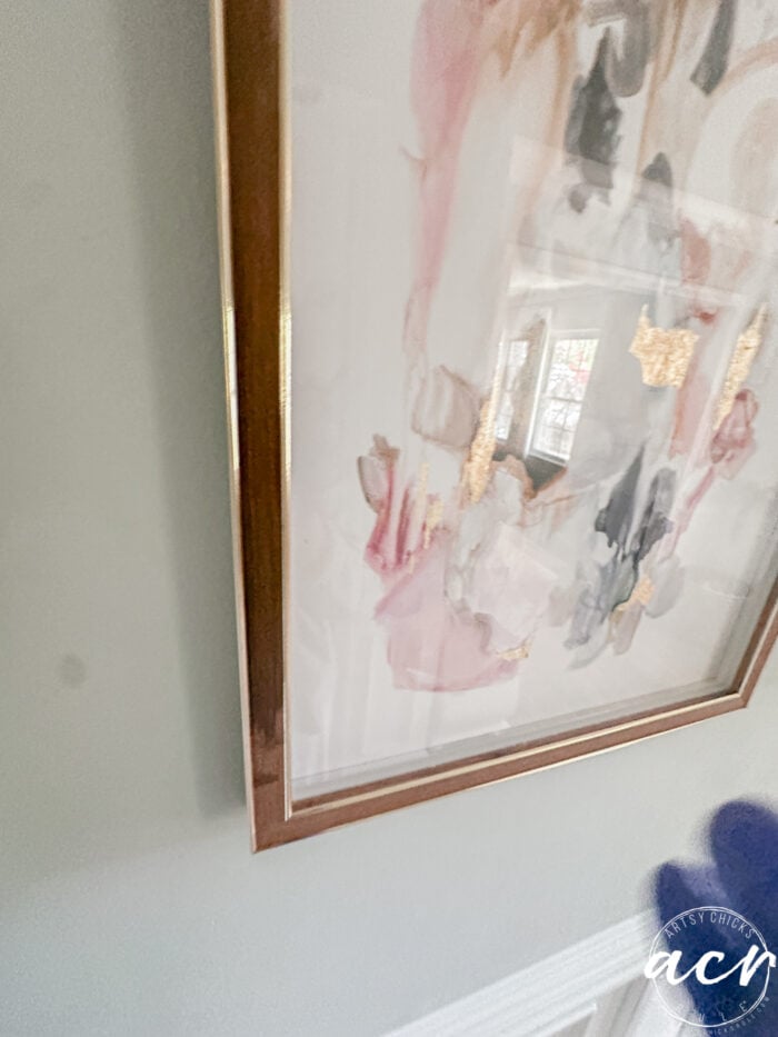 staining frame on wall
