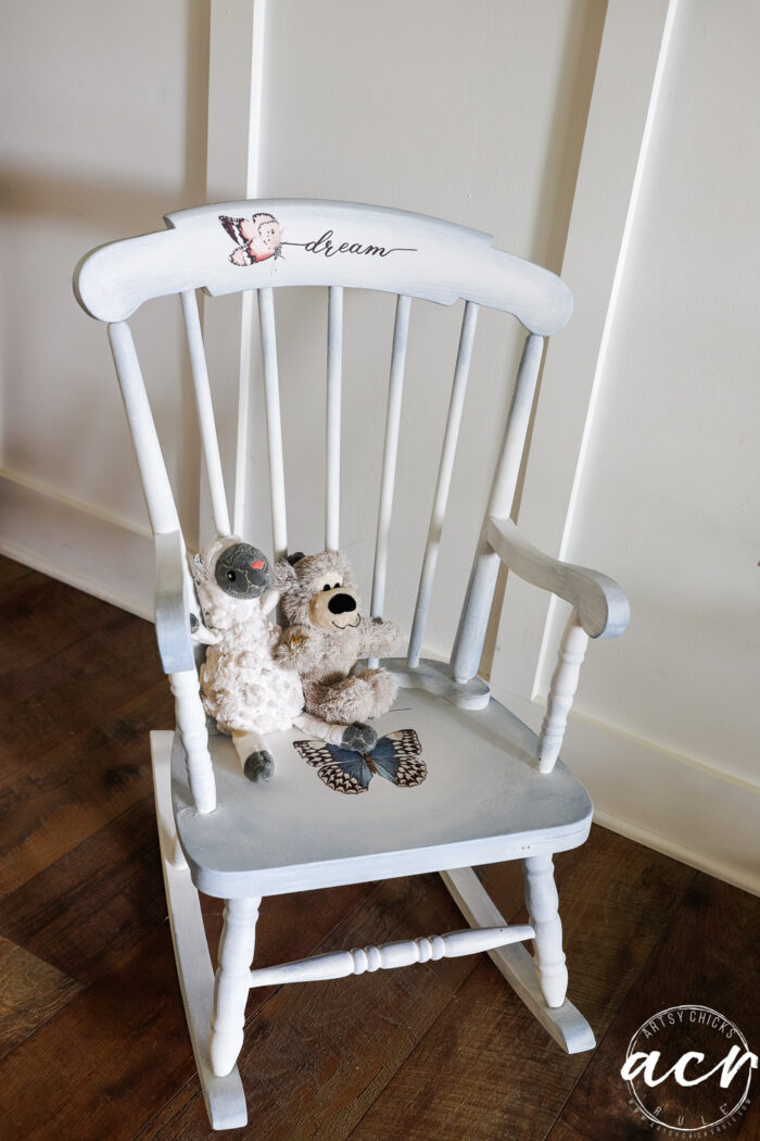 rocker with two small stuffed animals