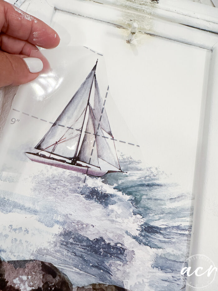 applying sailboat transfer to metal conatiner