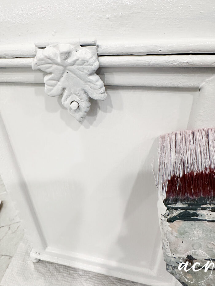 paint brush painting metal box white