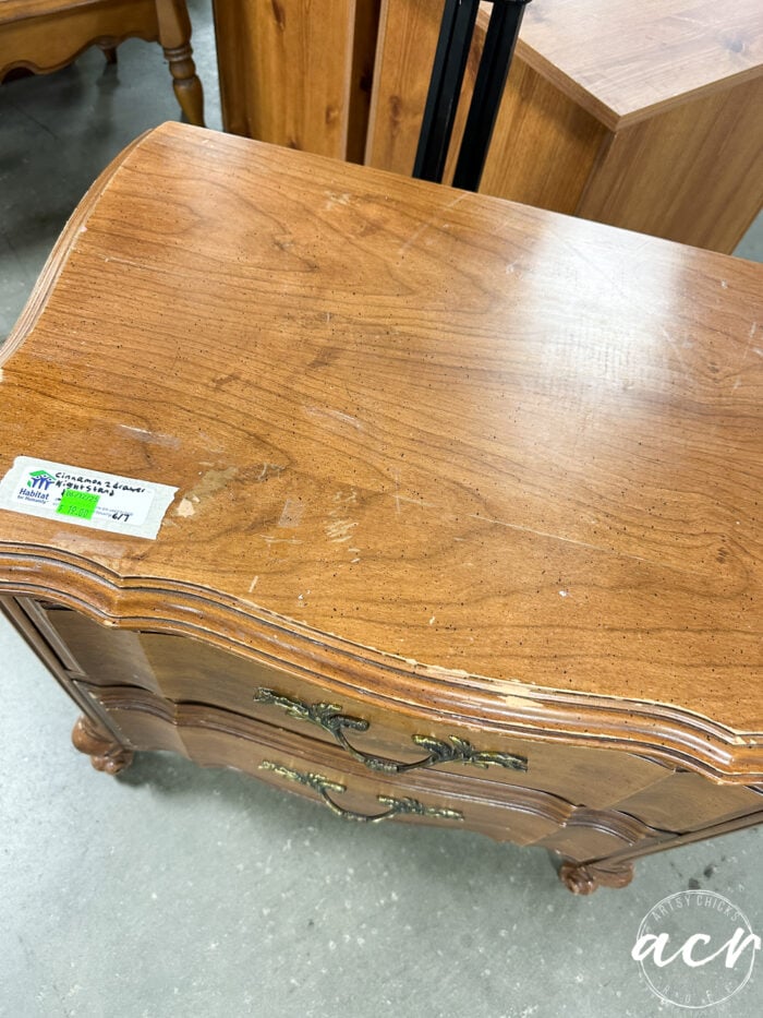 top of wood stained nightstand